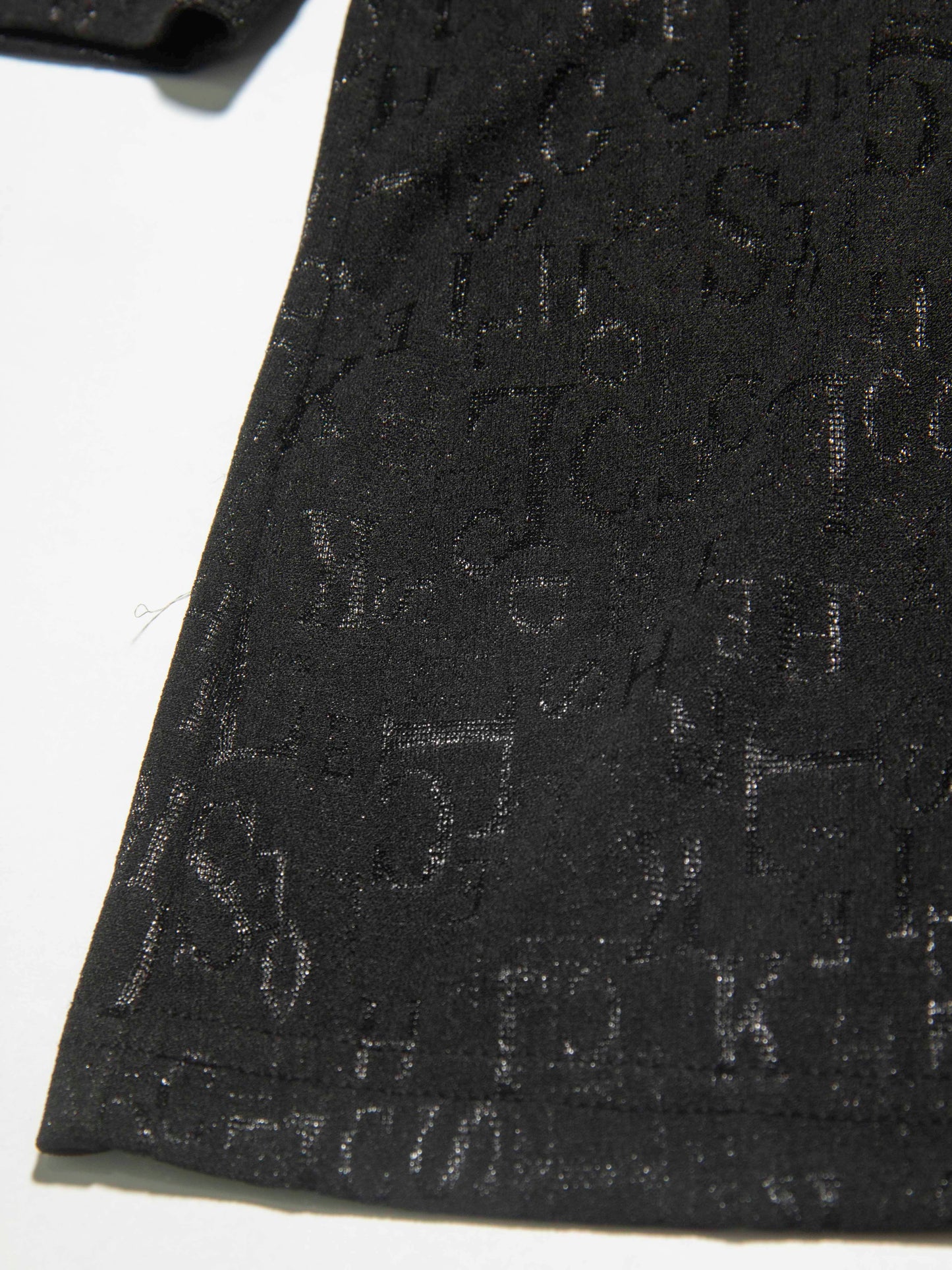 Letter Embossed Mock Neck Top
