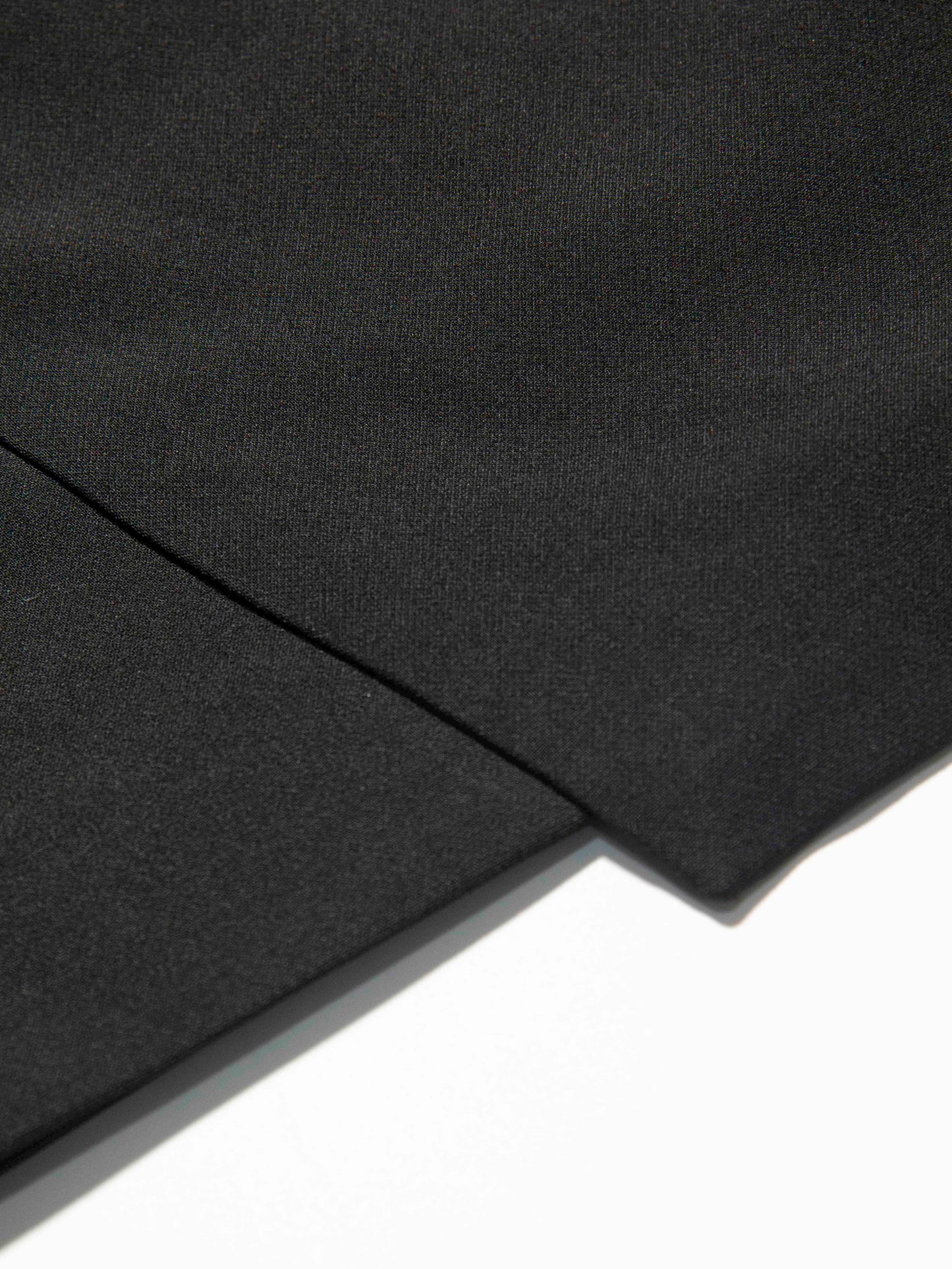 Black Overlap Mini Skirt with Gold Buckle Detail